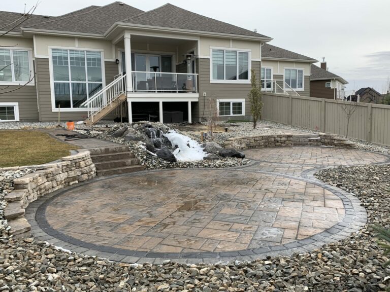 Landscaped multi-level backyard features
