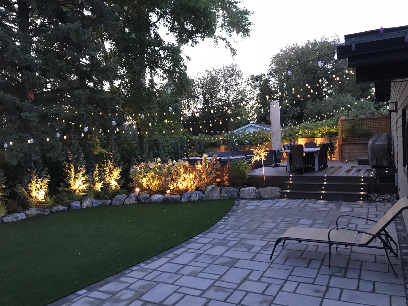 Backyard lighting from Leduc landscaping company, Isle Group